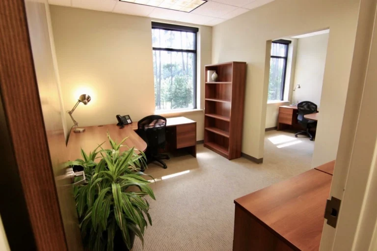 Office suite with window and desks